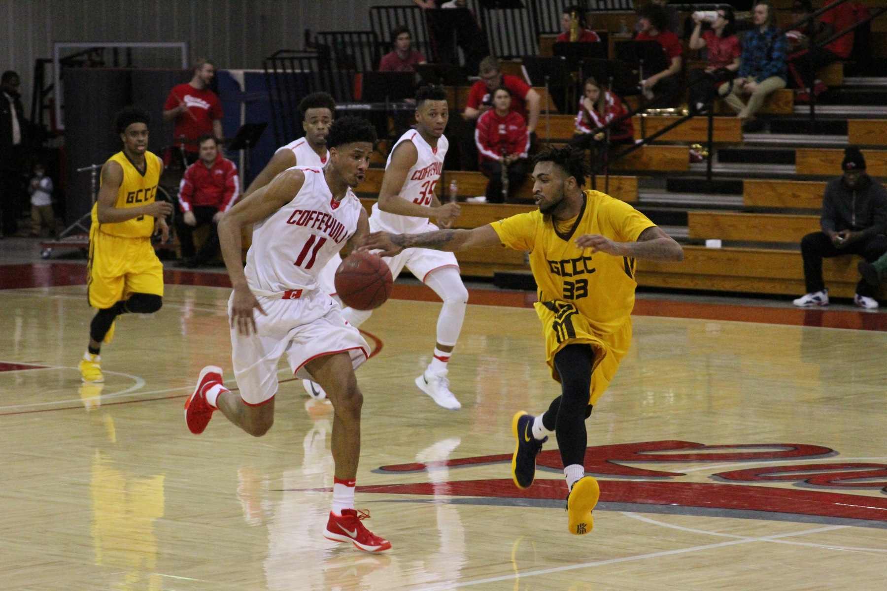 Red Ravens Lasso the Broncbusters 89-84